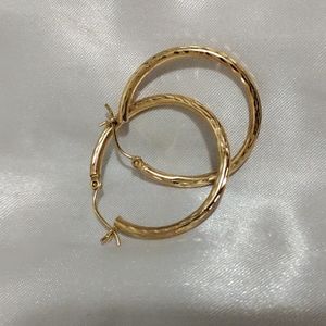 Medium sized gold toned hoop earrings